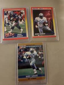 lot 166 image: Barry Sanders football trading cards from the early 1990s