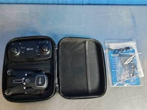 lot 58 image: Contixo F16 Arvo foldable drone with a 1080p HD camera, controller, and carrying case.