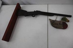 lot 10 image: Rustic Gone Huntin Wall Decor with Rifle and Duck Sign