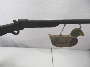 lot 10 image: Rustic Gone Huntin Wall Decor with Rifle and Duck Sign