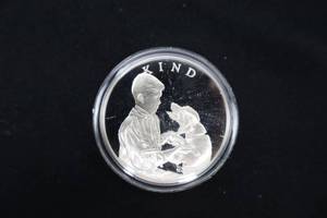 lot A-27 image: Boy Scouts Kind Silver Round - A Scout is Kind Sterling Silver Commemorative Coin