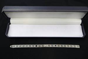 lot A-33 image: 10k White Gold Filigree Bracelet with Diamond and Blue Sapphires, 7.25 in, 10g