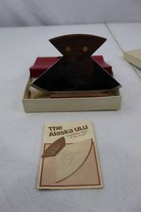 lot 39 image: Alaska Ulu Knife with Engraved Moose and Wood Stand