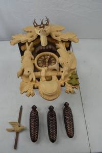 lot 67 image: German Black Forest Cuckoo Clock with Carved Woodland Motif and Weights