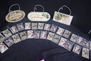 lot 126 image: Christmas Decor Lot 2 Sets 9ft Garland w Vintage-Style Santa Signs