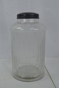 lot 91 image: Large Clear Glass Storage Jar with Black Lid, 12 Inch Tall