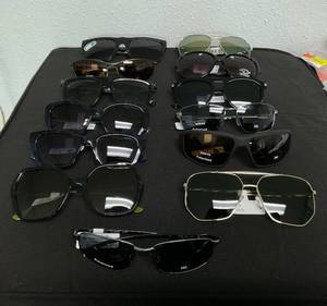 lot 180 image: LOT OF 13 Assorted Sunglasses (May Have Minor Scratches)