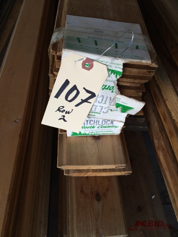 lot 107 image: Assorted Cedar 5 12 tongue & groove siding material - Random lengths