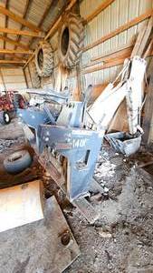 lot 85 image: Bobcat 709 Backhoe Attachment, Functioning, in Good Condition, Stored Inside