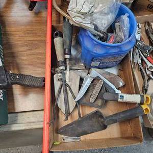 lot 16 image: Lockback Knife, Garden Tools, Skill Saw Blades, and Misc bolts,Ubolts