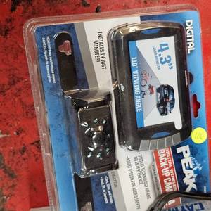 lot 106 image: 3 Sets Binoculars, Ear Muffs, As New Peak Backup Camera