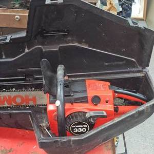 lot 128 image: Homelite 330 Chainsaw