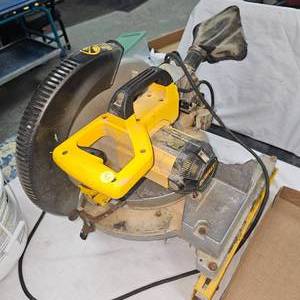 lot 129 image: Dewalt Miter Box Saw and Portable Stand