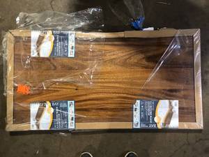 lot 13 image: Hampton Bay 4 ft. L x 25 in. D Finished Saman Solid Wood Butcher Block Countertop customer return see pictures