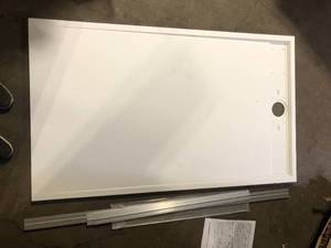 lot 14 image: Simple Project 60 in. L x 36 in. W Alcove Shower Pan Base customer return see pictures