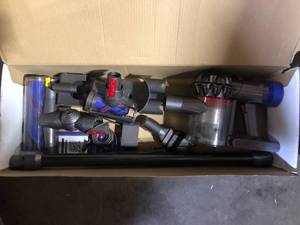 lot 64 image: Dyson V8 Cordless Stick Vacuum Cleaner used customer return review pictures