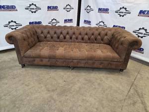 lot 3 image: Brown Tufted Leather Chesterfield Sofa