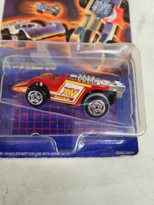 lot 55 image: Hot Wheels X-V Racers Experimental Vehicle in Sealed Packaging