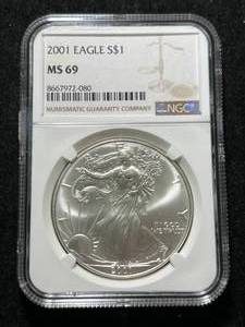 lot 28 image: 2001 AMERICAN SILVER EAGLE NGC MS69