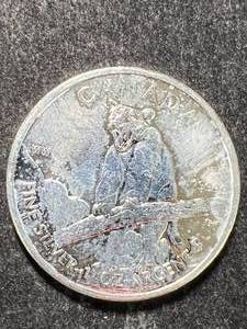 lot 52 image: 2012 CANADIAN COUGAR 1 TROY OZ .9999 FINE SILVER