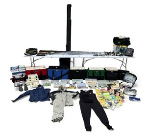lot 1 image: Huge Musky and Walleye Fishing Collection - Saltwater and Freshwater Rods, Reels, Tons of Lures, Tackle Boxes, Fishing Gear, Maps, Fish Finders, Other Tackle and Accessories