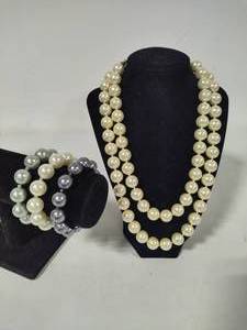 lot 56 image: Joan Boyce Two Strand Pearl Necklace  Three Bracelets