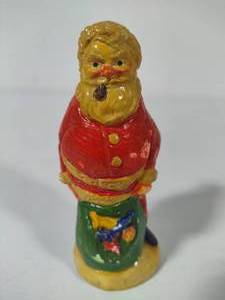 lot 101 image: Hand Carved Chalkware Santa