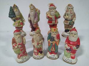 lot 102 image: Santas Around the World Santa Claus Porcelain Figurines Set of 8
