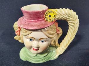 lot 67 image: Vintage Girl Head Vase  Planter