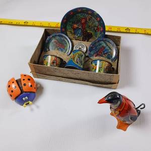 lot 10 image: Vintage Tin Wind Up Toys PLUS Ohio Art Company tin litho toy tea set, featuring illustrations from the Little Red Riding Hood story