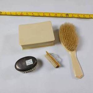 lot 12 image: Vintage named Ivory Brush Set