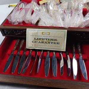 lot 24 image: Wooden case full of New Silver Plated Silverware