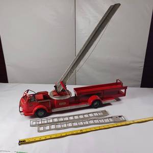 lot 32 image: Doepke Model Toys fire truck, Rossmoyne American LaFrance Aerial Ladder Truck.
