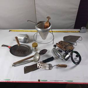 lot 39 image: Vintage Kitchen Tools  Butcher knife, sieve, electric iron
