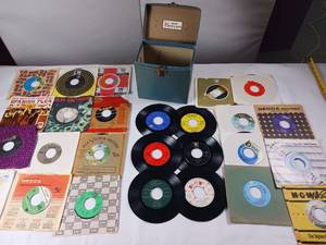 lot 53 image: Large lot of 45 RPM records many in original sleeves