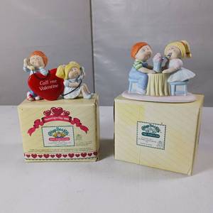 lot 56 image: two vintage Cabbage Patch Kids porcelain figurines from 1985