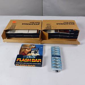 lot 64 image: Flash Barfor use with classic cameras, specifically those like the Polaroid SX-70 or various 110 cameras.