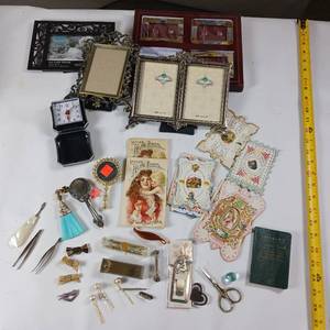 lot 67 image: Vintage collection of doll or girl items, including very old ornate cards