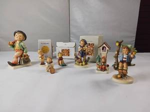 lot 93 image: MI Hummel  German made Collectible Figures  Numbered