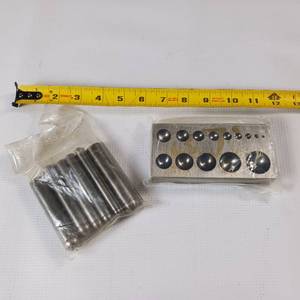 lot 104 image: Dapping Die and Block  Brand new in original plastic