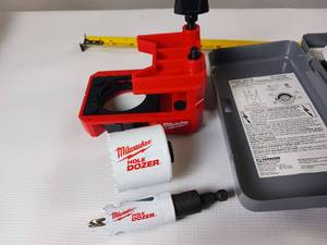 lot 116 image: Analog Timer for power supply, Milwaukee jig and various tool packs with sockets and a 25 powered tape measure