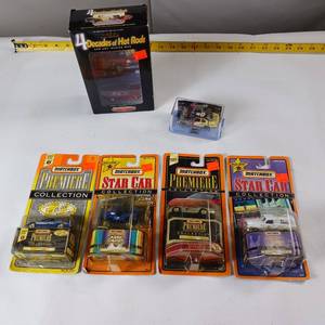 lot 139 image: NIB Match Box Cars  2 others  6 cars total