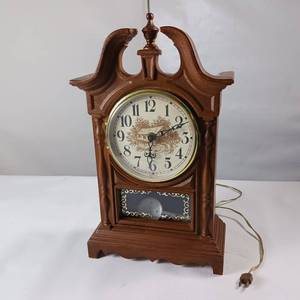 lot 144 image: Electric Clock with Old Cabin