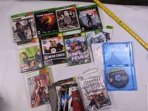 lot 162 image: Lot of 10 Xbox Games and Misc. Jackets