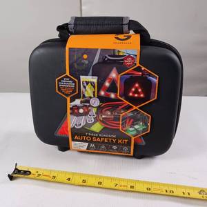 lot 206 image: Auto safety Kit  7 pc set  includes vest and jumper cables and a tire gauge