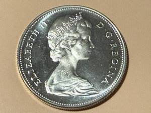 lot 15 image: 1967 Canadian Dollar Silver Coin