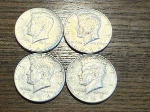 lot 28 image: 4 1964 Kennedy Half Dollars