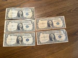 lot 41 image: 5 1935 $1 Blue Seal Silver Certificates
