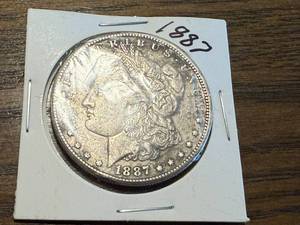 lot 48 image: 1887 S Morgan Dollar