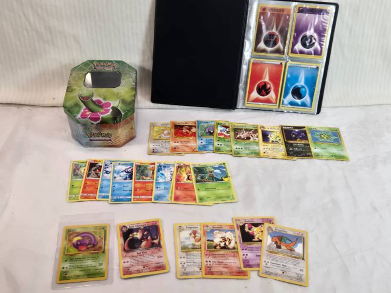 lot 41 image: Lot of Pokemon Trading Cards with Empty Tin and Binder